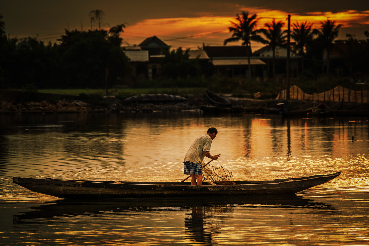 Checking Fish Traps Hue Vietnam
